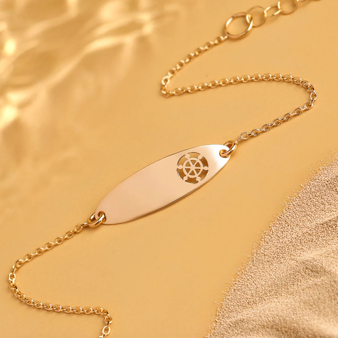 Bracciale Baby con targa ovale e timone traforato