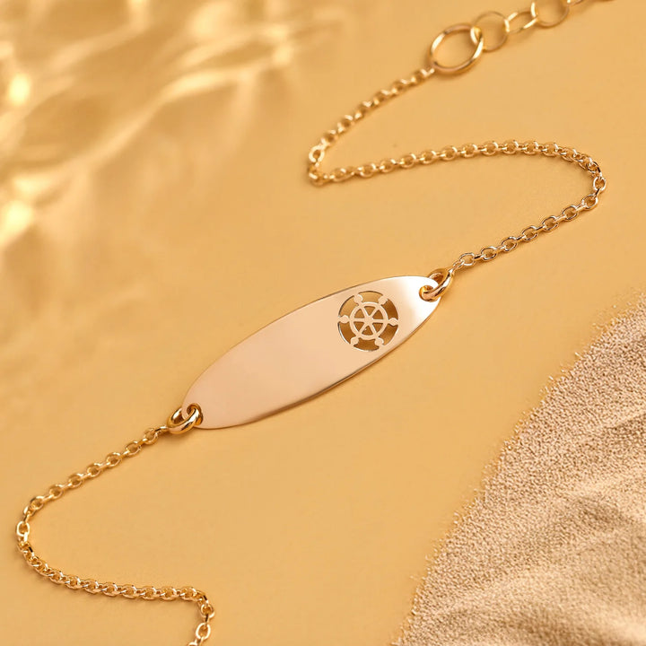 Bracciale Baby con targa ovale e timone traforato