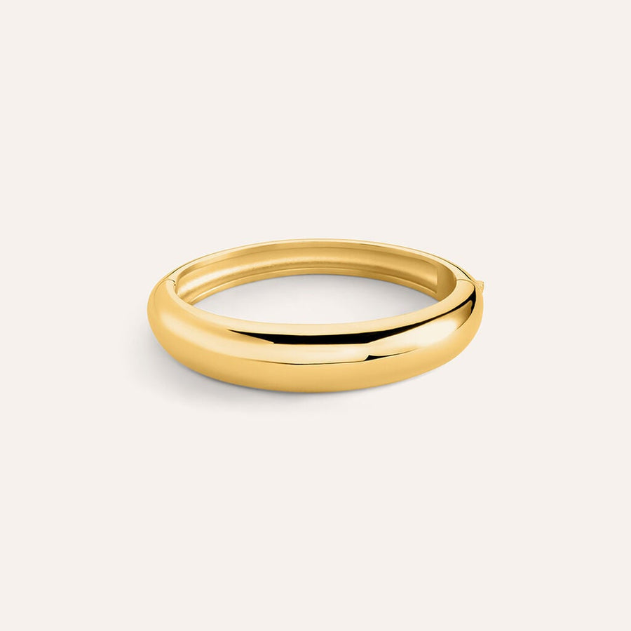 Bangle Radiance in acciaio dorato con chiusura a scatto