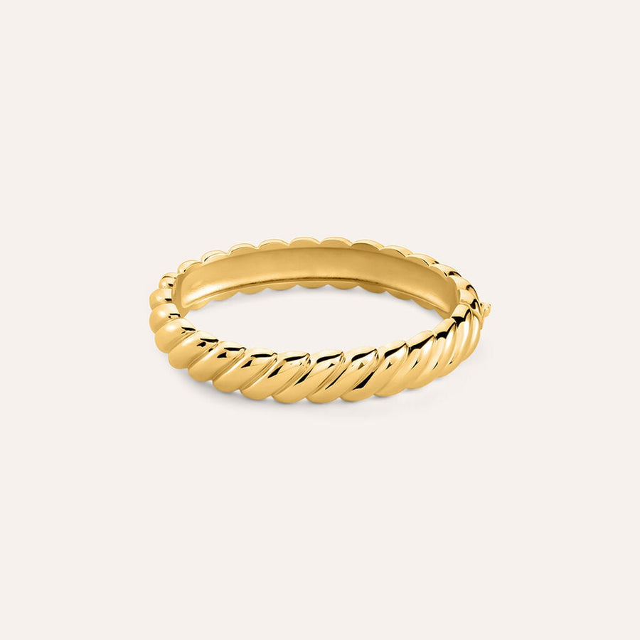 Bangle Radiance in acciaio dorato, chiusura a scatto