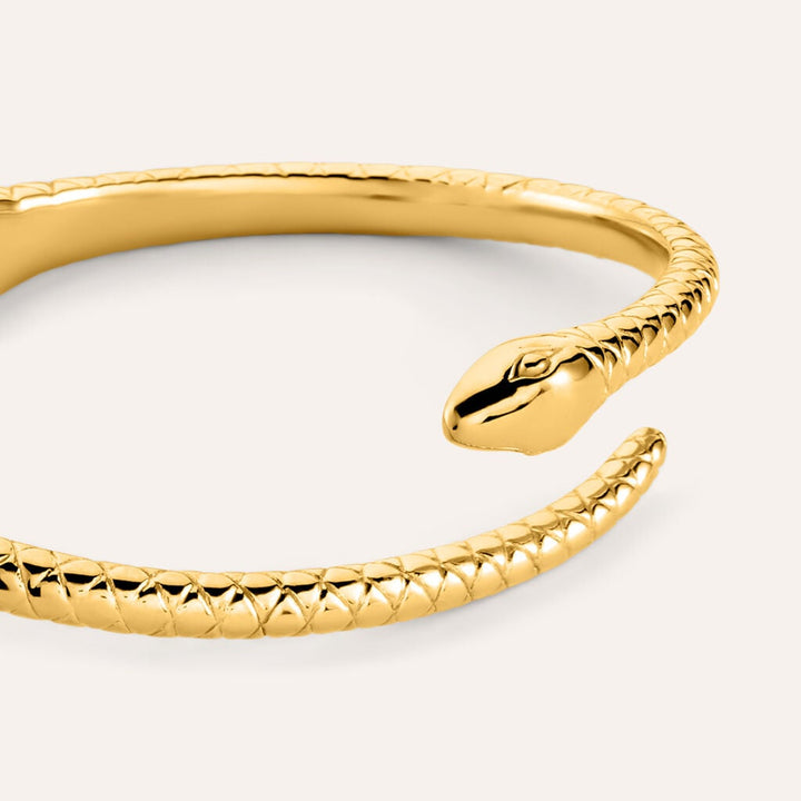 Bangle serpente Radiance in acciaio dorato