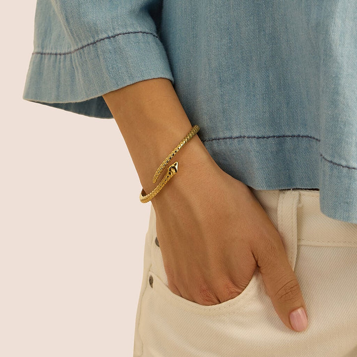 Bangle serpente Radiance in acciaio dorato