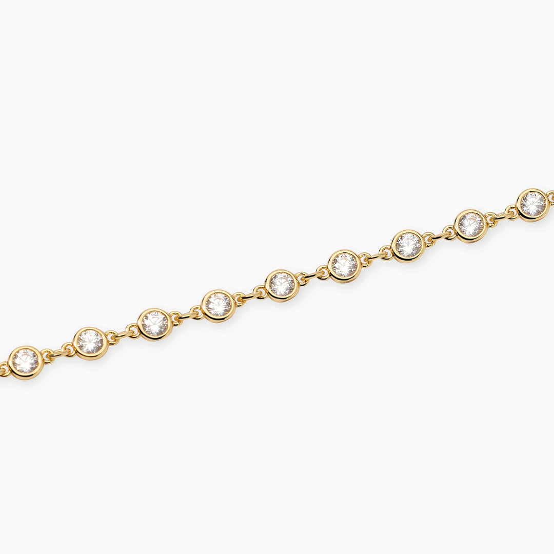 Bracciale SPOTLIGHT dorato con punti luce in zirconi