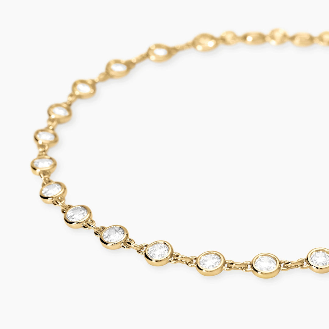Bracciale SPOTLIGHT dorato con punti luce in zirconi