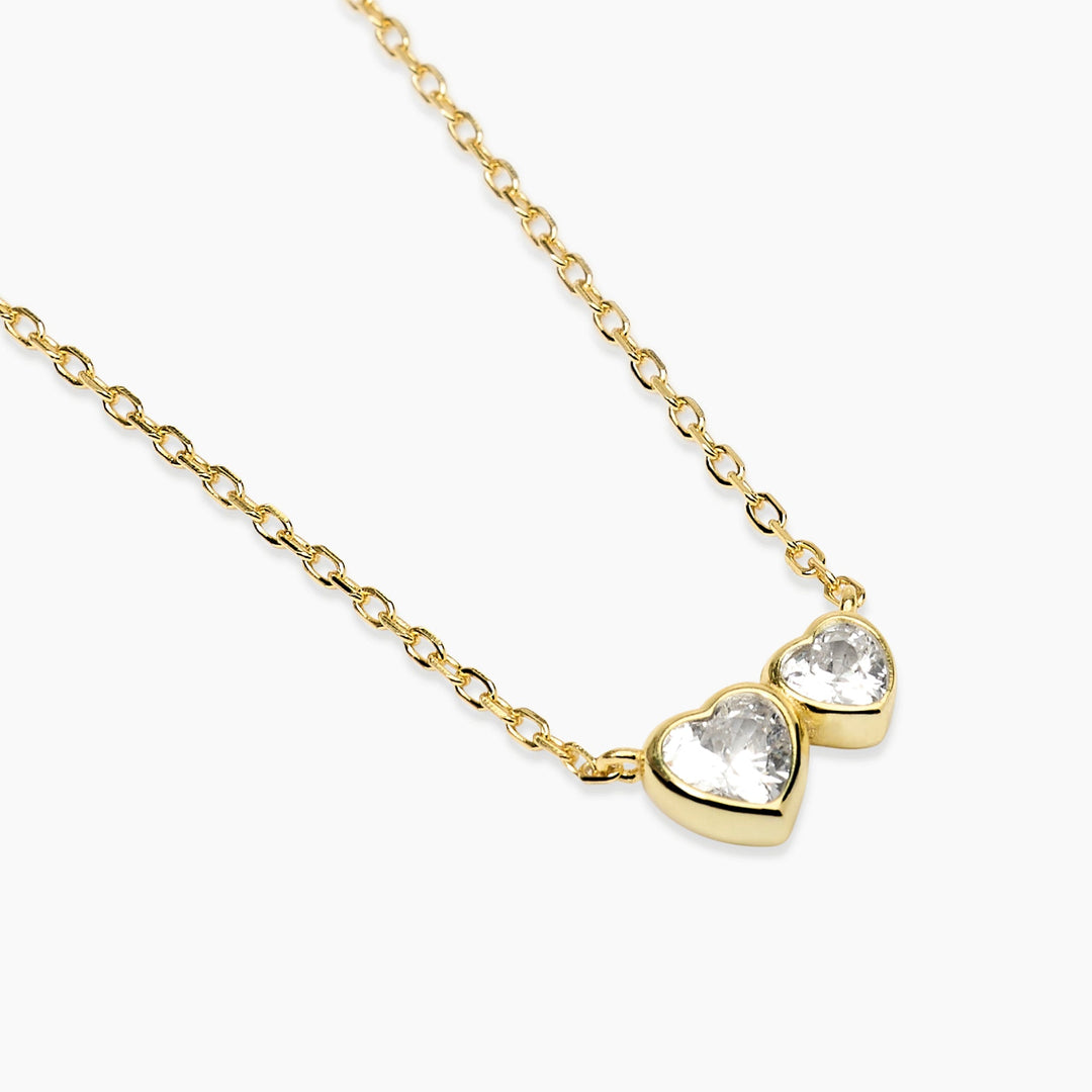 Girocollo SIAMO NOI dorato con cuori di zirconi