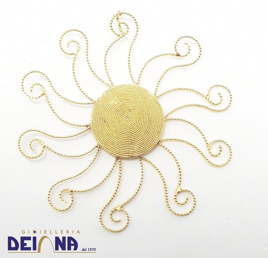 Ciondolo a forma di sole con corbula centrale in oro 18 KT lavo